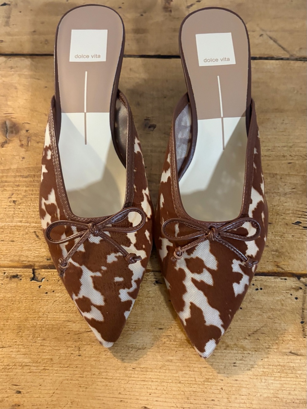 Dolce Vita Brown & White Cow-Print Pointed Mules with Bow